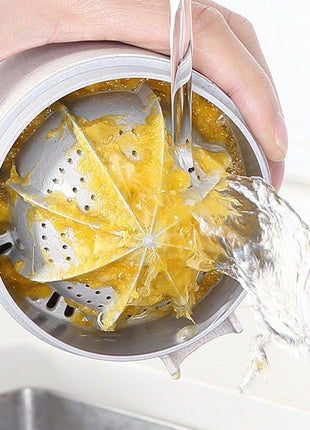 Manual Citrus Juicer with Measuring Cup, Lid, Strainer Ring and Dual Press Inserts