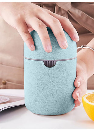 Manual Citrus Juicer with Measuring Cup, Lid, Strainer Ring and Dual Press Inserts
